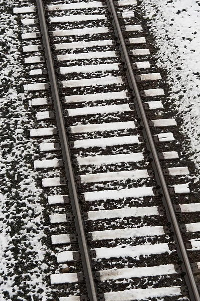 Train Tracks Lightly Covered With Snow; Alberta, Canada