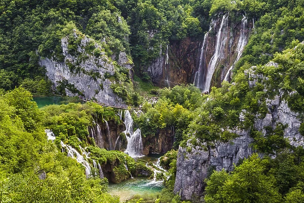 The tranquil, large waterfall at Plitvice Lakes National Park in Lika-Senj county in Croatia