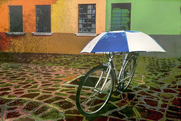 Wall Art Of Bicycle Protected By Blue And White Umbrella In Front Of Colourful Buildings On Burano Island On Canal In Venice, Italy