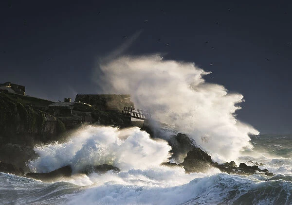 Wave Crashing Into Shore And Splashing Onto The Land Above The Cliffs, Isla De La Palomas; Tarifa, Cadiz, Andalusia, Spain