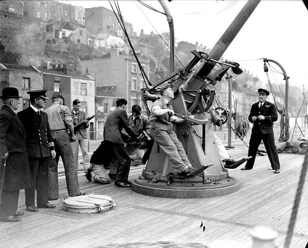 1939 - just at the outbreak of war - shows Royal Naval reservists undergoing gunnery