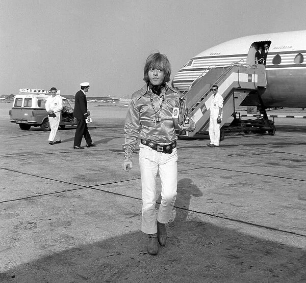 Brian Jones of the Rolling Stones pop group arrives at London