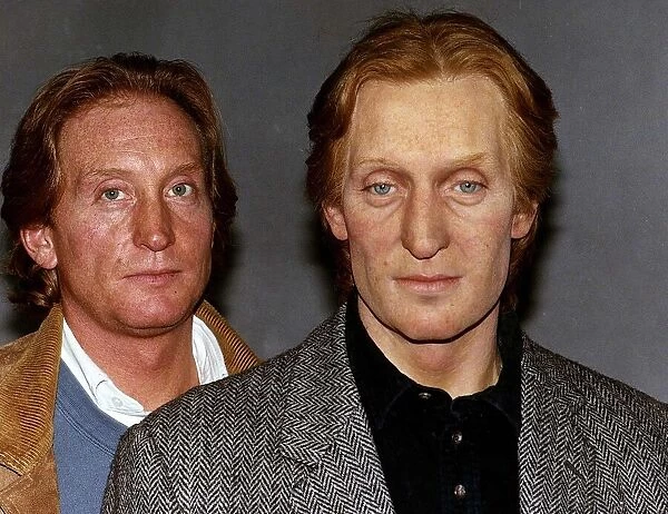 Charles Dance British actor at Madame Tussauds waxwork museum with his model