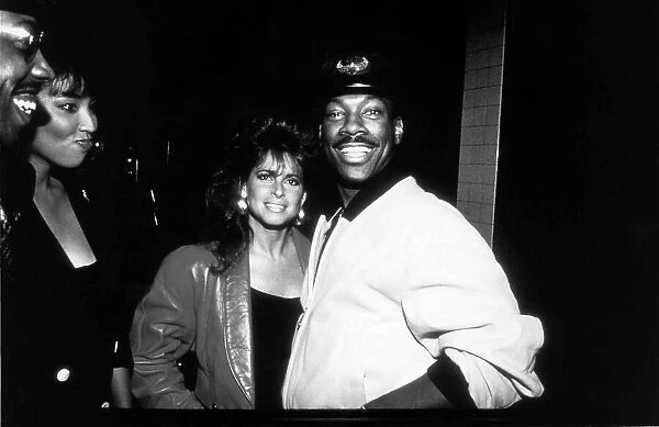 Eddie Murphy actor  /  comedian out with his latest date. November 1988