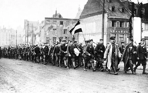 German soldiers march back into Germany after crossing the Rhine at Cologne