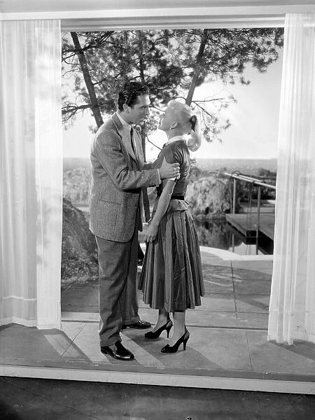 Ginger Rogers with husband Jacques Bergerac in a scene from the the film Lifetime