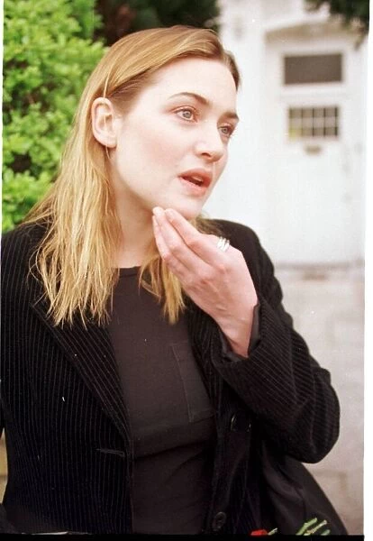 Kate Winslet pauses for thought April 1998 outside her home as she talks to Mirror