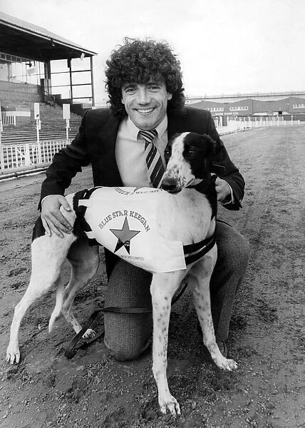 Kevin Keegan with the greyhound named after him Blue Star keegan. Circa 1983