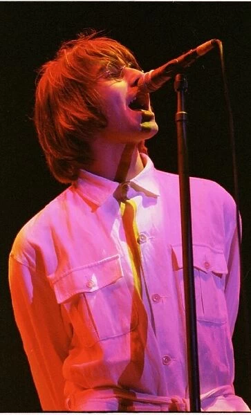 Liam Gallagher of Oasis singing at their Knebworth concert