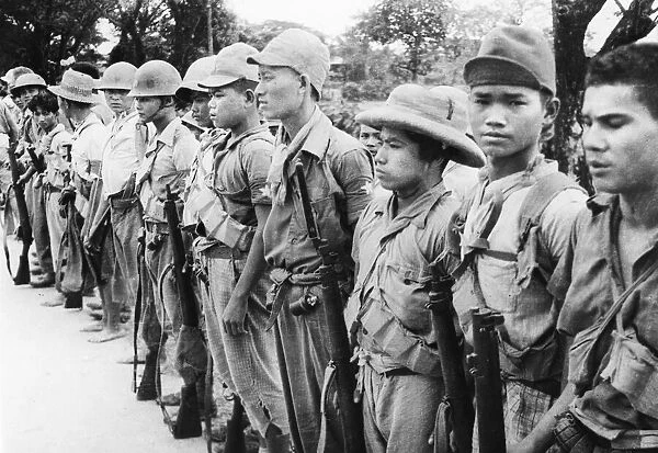 Men of the Patriot Burmese Forces are lined up prior to starting out for a Japanese