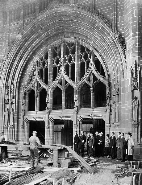 Men and women looking at the work being carried out on the construction of the Liverpool