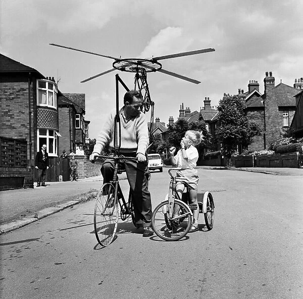 Mr Clifford Davis of Leeds Road Wakefield, tries out his flying machine made from bits of