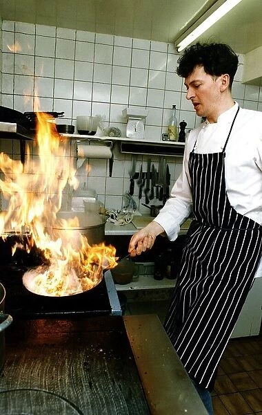 Nick Nairn chef cooking in kitchen flambe preparing starter restuarant Aberfoyle