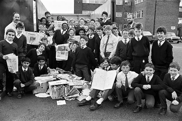 Piles of paper, these pupils from Almondbury High School have been helping to collect six