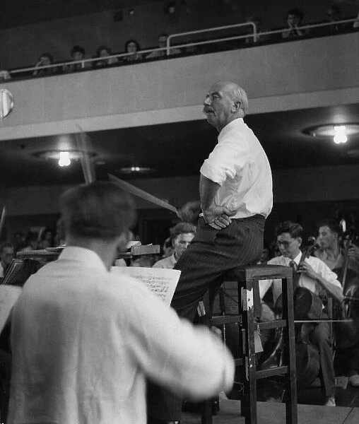 Sir Adrian Boult rehearses the National Youth Orchestra before a forthcoming concert at