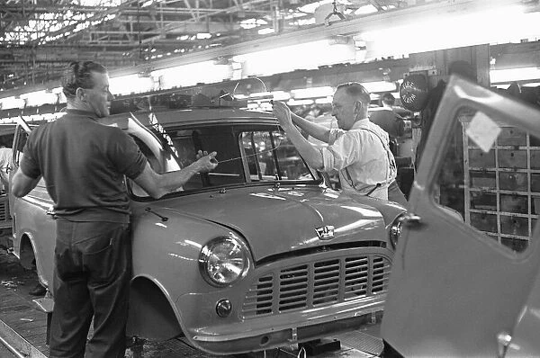 Windscreen being fitted to a Austin Mini van on the production line at Longbridge