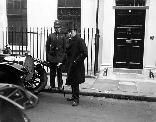 Winston Churchill MP Dundee (Liberal) pictured leaving house during Rail Strike