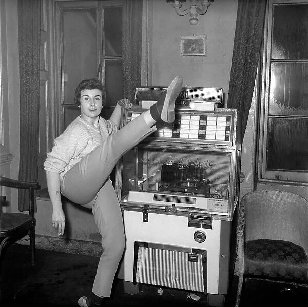 Woman selected tracks from juke box. 1960