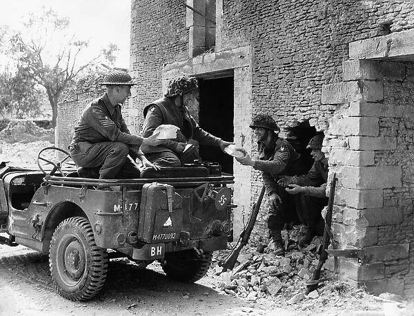 WW2 White bread being delivered by British troops in jeep from a bakery behind the line