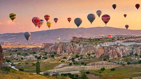Cappadocia balloons at sunrise, Goreme, Anatolia, Turkey