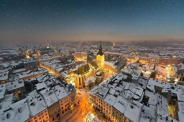 Gorgeus cityscape of winter Lviv city from top of town hall during sunset, Ukraine. Landscape photography