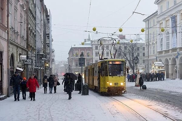 Lviv, Ukraine - January 5, 2019: Tram on Market square in winter time