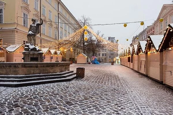 Lviv in winter time. Picturesque evening view on christmas fair on city center. Eastern Europe, Ukraine