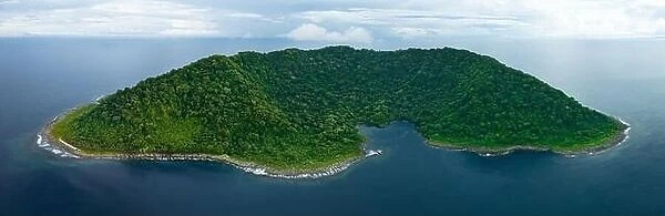 Rainforest covers the remote Mary Island which is fringed by a coral reef in the Solomon Islands. This country is home to amazing marine biodiversity