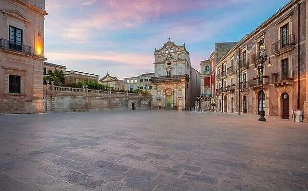 Syracuse, Sicily, Italy. Cityscape image of historical centre of Syracuse, Sicily, Italy with Piazza Duomo and Church of Santa Lucia alla Badia at sun