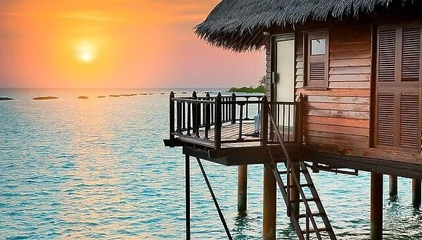 Tropical sunset landscape at Maldives Island, Indian Ocean