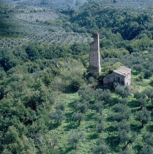 Aerial view of the land around Viterbo with a tower in ruins