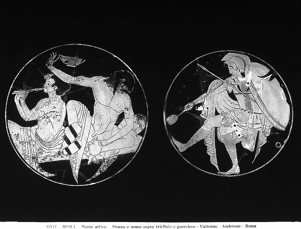 Attic cups with musicians on a triclinium and a warrior preserved in the Gregorian Etruscan Museum, Vatican City