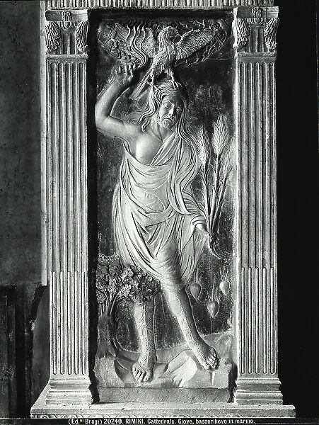 Bas-relief representing Jupiter, allegory of the planet. Chapel of the Sacrament or of the Planets. Work by Agostino di Duccio. Malatestiano Temple, Rimini