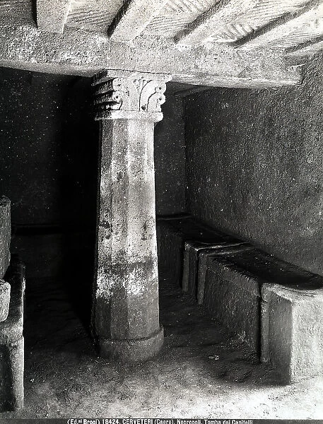 A column with flat fluted shaft and spiral capital in the Tomb of the Capitals in Cerveteri