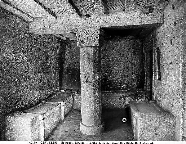 A column with flat grooves on the shaft and volute capital, the Tomb of the Capitals in Cerveteri