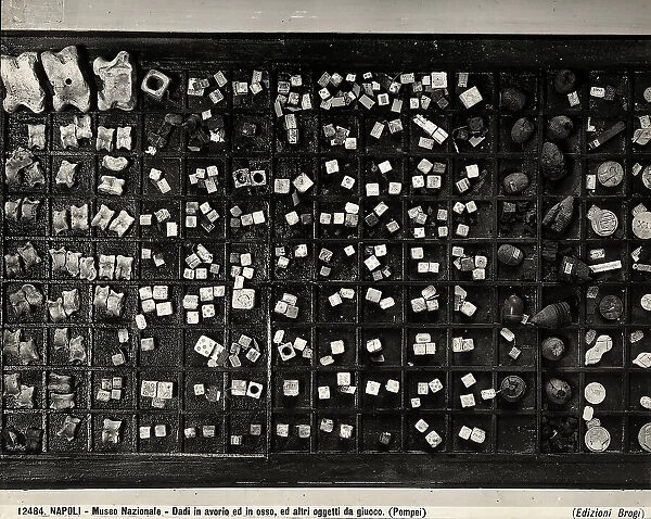 Dice in bone and ivory, and other objects for playing games. The finds from Pompeii are now kept at the National Archaeological Museum in Naples