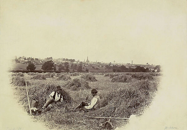 Farmers resting during the harvestin of hay