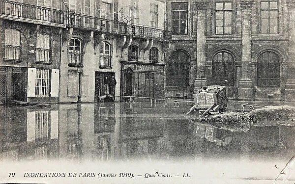 Flood of Paris, 1910: view of the Quai de Conti flooded; postcard