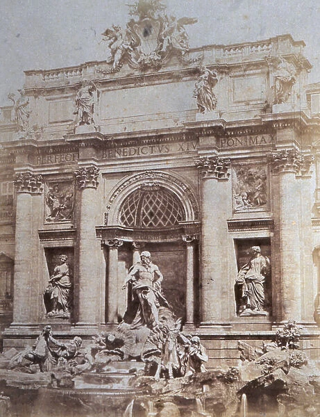 The Fountain of Trevi, with numerous statues and niches, in Rome and crowned by the coat of arms of Pope Clement XII