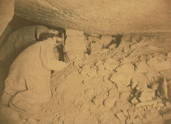 Miners in the catacombs of Paris (ossuaire municipal): underground ossuary of the town of Paris in the galleries of an old quarry