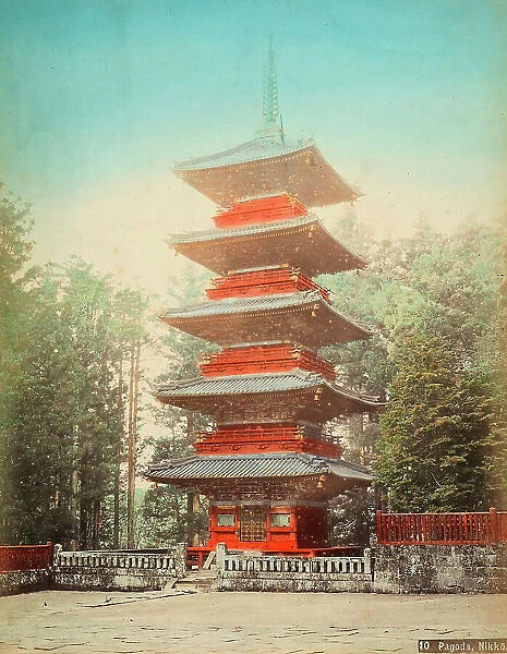 Photo of a pagoda in a forest at Nikko, Japan