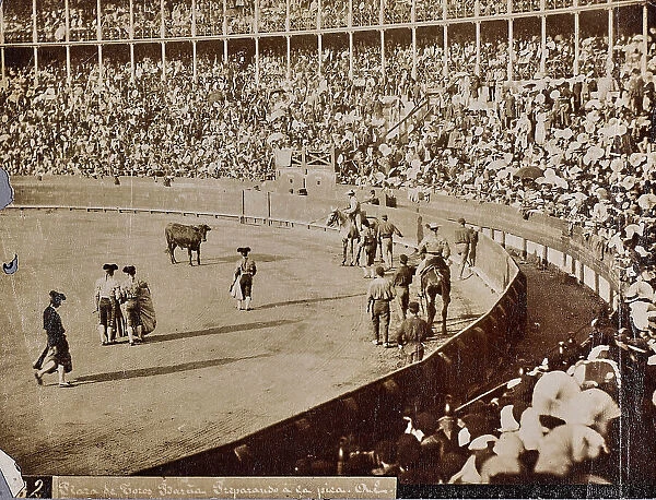 The picadors prepare to approach the bull during a bullfight