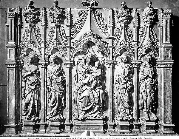 Poliptych representing the Virgin and four saints, sculpture by Jacopo della Quercia preserved in the Chapel of Trenta in the Church of St. Frediano, Lucca