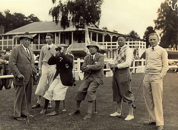 Portrait of a group of golfers and spectators on the tournament course in St. Germain, France