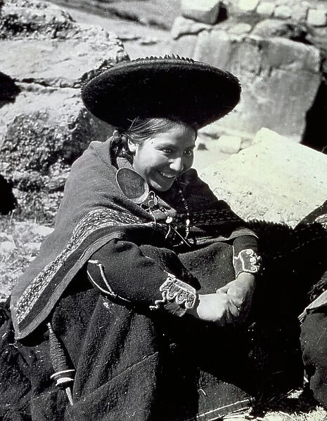 Portrait of a young native of Cuzco in ethnic dress