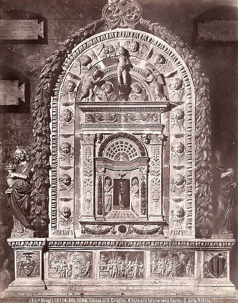 Saint Christina's altarpiece, in glazed terracotta, at Saint Christina's Collegiate Church in Bolsena. Two scenes from the Saint's martyrdom are shown in the predella
