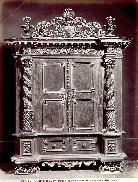 Seventeenth century walnut wardrobe ornately carved with plant motifs, in the Museo Archeologico Nazionale in Parma