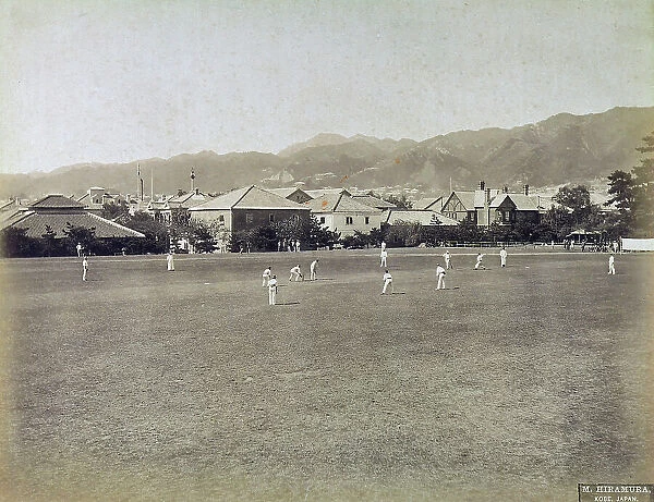 View of a field where a cricket match is taking place in Kobe, Japan