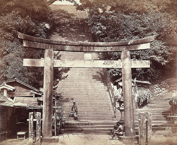 View of the hundred-step stairway at the entrance to Attango-yama or the Mount of the God Attango in Edo (ancient name of Tokyo). In the foreground, the Torii entrance door. On the stairway, a samurai. A local is seated on the base of a column of the Torii door