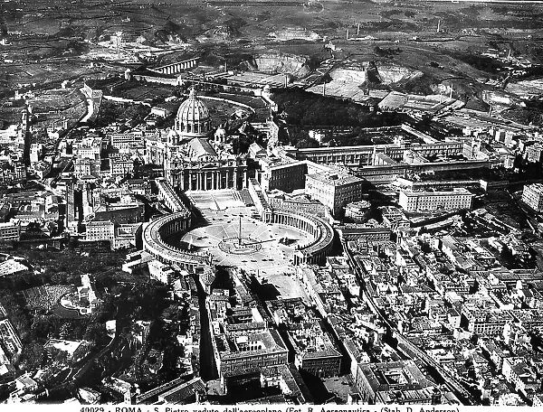 View of Piazza San Pietro with the basilica and the famous colonnade by Bernini. Vatican City